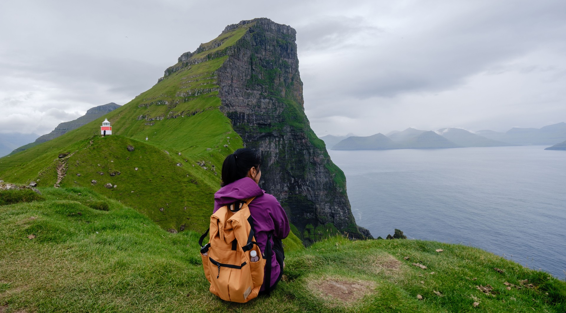 Exploring the breathtaking cliffs of Faroe Islands with stunning ocean views